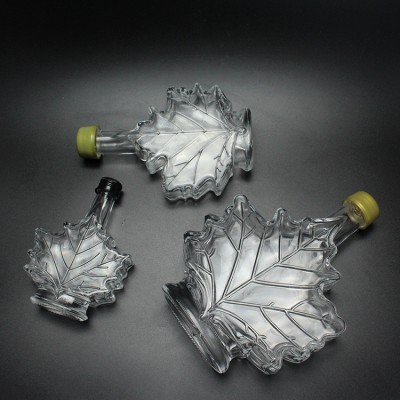 Latest Leaf Shape Engraving Liquor Bottle Long Neck Rum Vodka Whiskey Glass Bottle