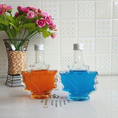 Latest Leaf Shape Engraving Liquor Bottle Long Neck Rum Vodka Whiskey Glass Bottle